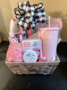 a basket filled with pink items on top of a table