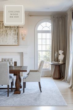 a dining room table and chairs in front of a fireplace