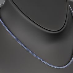 Embrace refined elegance with our Natural Blue Ombre Sapphire Tennis Necklace. This dainty, minimalist piece features a stunning gradient of natural sapphires, making it a unique and sophisticated addition to any jewelry collection. Perfect as a personalized gift for her, this necklace effortlessly combines modern style with timeless beauty. Crafted with meticulous attention to detail, it embodies the luxury and charm that Evara Jewelry is renowned for. 𝐅𝐞𝐚𝐭𝐮𝐫𝐞𝐬:• 𝐌𝐚𝐝𝐞 𝐭𝐨 𝐎𝐫𝐝𝐞? Elegant Blue Tennis Necklace As A Gift, Elegant Blue Tennis Necklace As Gift, Elegant Blue Tennis Necklace For Gift, Luxury Sapphire Necklace With Prong Setting, Luxury Sapphire Necklace In Prong Setting, Luxury Blue Necklace With Prong Setting, Elegant Single Strand Blue Jewelry, Elegant Blue Jewelry With Vvs Clarity, Elegant Blue Single Strand Jewelry