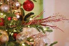 a christmas tree decorated with ornaments and lights