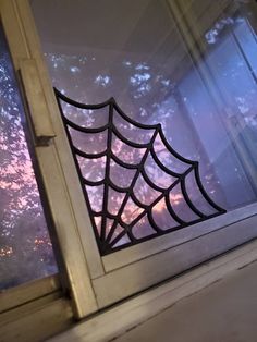 a window with a spider web on it