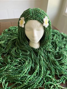 This listing is for a multi colored green wig that can be used for many different characters, including Te Fiti, Mother Earth, Mother Nature, Tree Hugger, or Sea Creature This wig is a crochet hat style with attached strands of hair.  This Wig is made with 2 flowers, but can come without them if preferred, or can be made in a different color. Please write the color difference in the notes, including the inside color, and petal color. This wig will naturally fray at the ends.  Sizes are approximates, and are measured while unstretched. The wig is stretchy, so doesn't need to be exact.   6-12 months: 16-17 inches in circumference                         6 inches in height  Toddler: 17-18 inches in circumference                           6.5 inches in height Child XS (3-4): 18-19 inches in ci Mother Earth Costume, Te Fiti Costume, Earth Costume, Hair Tree, Mother Nature Costume, Te Fiti, Crochet Wig, Earth Mother, 2 Flowers