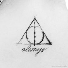 a harry potter tattoo on the back of a woman's neck