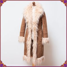 "The ultimate 70s style Penny Lane afghan coat of our DREAMS 🖤😍 Definitely much more stunning in      person!! Size S ⫸ Super shaggy fur made from faux Mongolian lamb ⫸ Condition: IMMACULATE condition! Without any stains or odors. Please see the pictures ❀ Don't       hesitate to contact me if you would like to see more pictures or have any questions. ⫸ mid-weight, warm & snuggly ⫸ Ultra soft and cozy ⫸ Huge faux mongolian fur collar! ⫸ Long & curly fake mongolian tibetan fur trim ⫸ Fully line Vintage Fur Coat, Afghan Coat, Bohemian Long Coat With Faux Fur Trim, Bohemian Long Fur Coat With Faux Fur Trim, Bohemian Faux Fur Coat For Winter, Penny Lane Coat Sewing Pattern, Red Penny Lane Coat, 70s Afghan Coat, Bohemian Brown Fur Coat With Faux Fur Lining