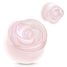 two pink swirls on top of each other in front of a white background,