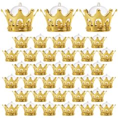 twelve gold crowns with clear glass balls on each one, all in the same pattern