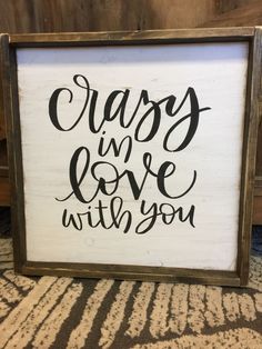 a sign that says crazy in love with you