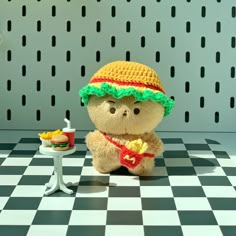 a teddy bear wearing a hat and eating food