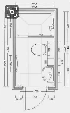 a drawing of a bathroom with toilet, sink and bathtub in the floor plan