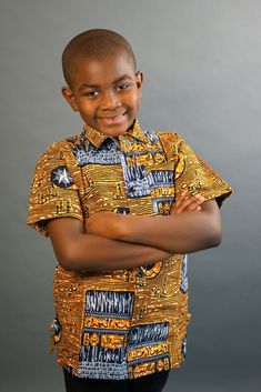 This short sleeved African Print shirt is real cute. Dress him up in this cute African outfit and he will attract a lot of attention and draw tons of compliments. He can wear it whenever he wants to project his African Identity. He can wear it to church, during Sankofa, Kwanzaa, and any African American or Afrocentric Cultural event. *Hand Sewn African Dress *Made by Local Artisans in Africa *100% Cotton *Made in Ghana *Portions of proceeds donated to charities in Africa *Everything in stock is Printed Cotton Half Sleeve T-shirt, Cute Short Sleeve Sets With Graphic Print, Cotton Half Sleeve Shirt With Graphic Print, Casual Fitted Collared Set, Brown Printed Short Sleeve Tops, Blue Printed Sets With Short Sleeves, Blue Printed Short Sleeve Sets, Casual Printed Short Sleeve Sets, Casual Short Sleeve Printed Sets