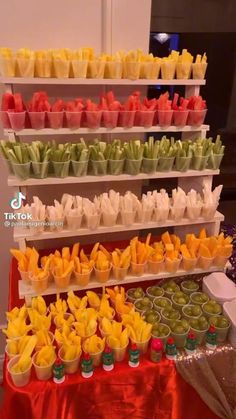 several trays filled with different types of food