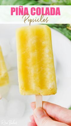 A hand holding the stick of a yellow popsicle that is pina colada flavored. Dole Whip Popsicles, Pina Colada Popsicles, Pineapple Popsicles, Tropical Desserts, Fruit Popsicles, Homemade Popsicles, Dole Whip, Ice Cream Treats, Popsicle Recipes