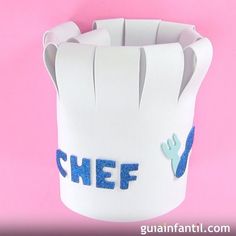 a paper cup that has the word chef in blue on it and is shaped like a hand