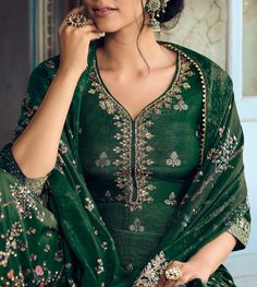 COLOR : Pine Green FABRIC : Top - Pure Dola Silk Jacquard, Bottom - Soft Crepe , Dupatta - Chinon Silk WORK : Woven Zari Work, Zari Embroidery, Digital Print, Hand Work, Beads, Stones, Sequins, Lace Border OCCASION : Wedding, Reception, Engagement, Party Wear READY-TO-WEAR : NoSTITCHING : Available as semi-stitched fabric, can be stitched using standard size option (+$20). Note: There might be a slight color variation due to lighting and flash used during photoshoot. The bright shade seen is the Wedding Gharara, Green Gharara, Green Sharara Suit, Red Anarkali Suits, Green Sharara, Indian Suits For Women, Gharara Suits, Salwar Dress, Silk Bottoms