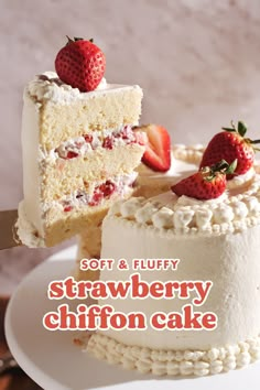 a white cake with strawberries on top and the words soft & fluffy strawberry chiffon cake