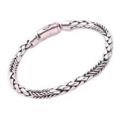 a braid bracelet on a white background