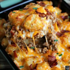 a cheesy casserole dish with meat and cheese