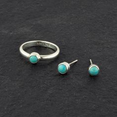 That’s it. Looks like you’ve already fallen for these tiny turquoise stud earrings. Who can resist their vivid pop of color and perfectly round shape? A fun twist on the classic stud theme, these cuties will be with you day and night. Call it love at first sight. Wear it with a matching ring. Gemstone - Genuine Turquoise 925 Sterling silver High polish finish Approx. 4mm Handmade in Taxco, Mexico Outfits Matching, Southern Outfits, Turquoise Stud Earrings, Earrings Gemstone, Simple Ring, Matching Ring, Twist Ring, Turquoise Stones, Matching Rings