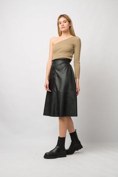 Black Faux Leather Skirt,Loose Skirt,High Waisted Leather Skirt,Under Knee Skirt,Classic Women Leather Skirt,Women PU vegan flared skirt -Soft black PU fabric -Pleated maxi skirt -Black faux leather winter skirt -Midi calf length -High waistline -Elastic waistline SIZE:one size -Dry clean -Hand wash Women Leather Skirt, Leather Skirt Midi, High Waisted Leather Skirt, Black Faux Leather Skirt, Loose Skirt, Knee Skirt, Knee Skirts, Pleated Maxi Skirt, Black Leather Skirts