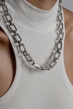 With a striking marriage of rectangular and circular links, Himalia has many sides to admire. This design looks stunningly different from every angle. Models are wearing size 20" chains. Material: Stainless Steel Modern Long Necklace Jewelry, Modern Silver Link Chain Jewelry, Modern Silver Chain Link Jewelry, Modern Sterling Silver Link Chain Jewelry, Modern Jewelry With Chunky Chain And Rectangular Links, Modern Jewelry With Box Chain Link, Modern Box Chain Link Jewelry, Modern Chain Link Necklaces, Formal Rectangular Pendant Chain Jewelry