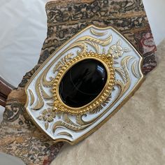 "Natural Black Onyx Belt Buckle - Western Style Belt Buckle - Cowboy Belt Buckle - Boho Belt Buckle: This western style belt buckle features a natural Black Onyx stone.  The stone is 40mm x 30mm (1 1/2\" x 1 1/4\").  The buckle is 3 1/2\" x 2 3/8\" and will work with a belt that is up to 1 3/4\" wide.  The belt buckle blank was made in the USA and purchased from our suppliers to hold our hand-crafted stones.  This Black Onyx stone was shaped and polished by hand in our workshop in Arizona.  This stone has a fantastic black color and few thin white stripes that really looks great in this buckle!  This is a one of kind buckle that you can be proud to own or to give as a present!  As with all our belt buckles, we will ship this buckle in an elegant gift box for no extra charge!  Note: The sil Western Bolo Tie, Cowboy Belt Buckles, Boho Belt, Cowboy Belt, Boho Belts, Western Belt Buckles, Western Belt, Great Western, Black Onyx Stone