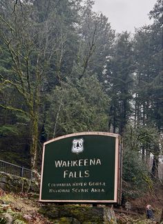 the sign for wawkeena falls state park is in front of some trees