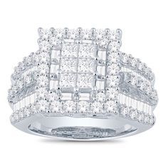 a white gold ring with two rows of diamonds on the band and one row of baguetts