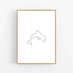 a minimal line drawing of a dolphin's head in black and white, framed on a wall