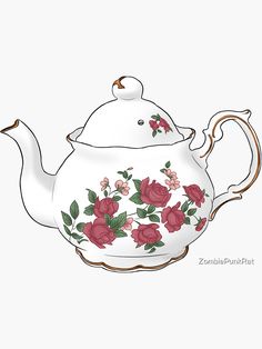 a tea pot with flowers painted on it