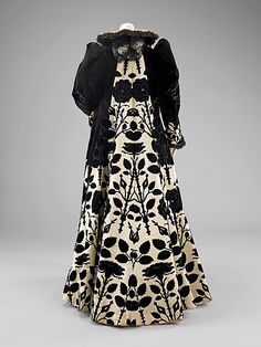 Evening coat, House of Worth, French, circa 1900, silk, 60 inches in length Evening Coat