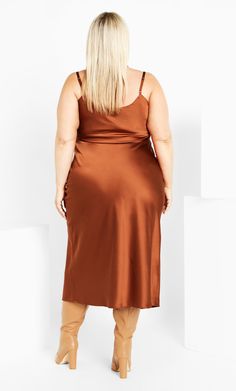 Indulge your sweet tooth with the Alani Dress in toffee! The cowl neck and adjustable shoulder straps infuse elegance into this slip-style midi dress, making it a versatile choice for any occasion. Key Features Include: - Cowl neck - Adjustable shoulder straps - Slip style - Midi length - Pullover style Wear this with some platform heels and dainty jewelry for a date night look. | Plus Size Alani Dress in Toffee, Size 18 | City Chic Night Looks, City Chic, Dainty Jewelry, Toffee, Platform Heels, Cowl Neck, Pullover Styling, Midi Length, Dress Making