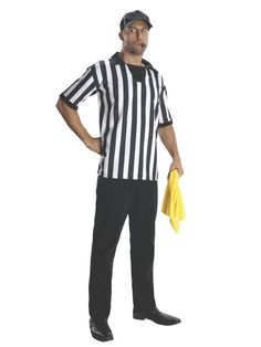 a man in a referee outfit holding a yellow towel