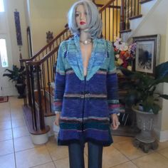 A Touch Lighter Than A Coat, Free People's Cardigan-Coat Still Feels Substantial And Makes For A Chic Layer In The Transitional Months. It's Designed In An Inside Out Style In A Chunky-Knitted Colorful Pattern, Which Is Joyfully Soft And Springy To Touch. Front Large Hook & Eye Closure. Size M. This Is An Oversized Very Fashionable Cardigan!. Retail For $398. No Stains, Or Rips. Comes From A Smoke Free Home. Blue Knitted Long Sleeve Outerwear, Blue Long Sleeve Knitted Outerwear, Blue Wool V-neck Outerwear, Purple Knitted Long Sleeve Outerwear, Blue Wool Cardigan For Fall, Blue Fitted Wool Sweater, Fitted Blue Wool Sweater, Fitted Multicolor Knitted Outerwear, Blue Wool Long Sleeve Cardigan