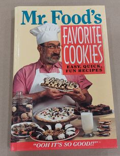 the cover of mr food's favorite cookies cookbook, with an image of a man holding a tray of desserts