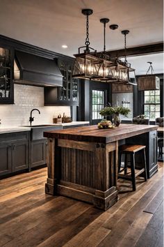 Multi-functional rustic kitchen island with iron accents Barndo Kitchen Ideas Farmhouse, Rustic Kitchen Island Ideas, Rustic Kitchen Cabinet, Farmhouse Island, Kitchen Cabinet Inspiration, Barndominium Interior, Gothic Dollhouse, Makeover Kitchen, Ranch House Decor