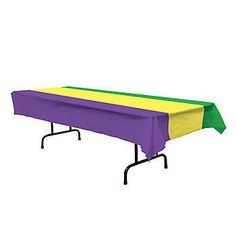 a purple and yellow table cloth on a black metal frame with two green stripes at the top