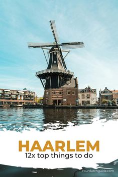 a windmill sitting on top of a body of water next to buildings and the words haarlem 12x top things to do