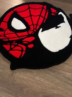 Custom Handmade Spider-Venom rug. Able to customize at different sizes or colors, please message me if you have any questions. At just a glance, this looks like just a tufted vibrant rug, but its a comic inspired art piece. This rug can brighten any room and just add a hint of fun.  This rug is versatile and can be used in any area of your home. Whether you want to place it in your living room, bedroom, or even your kitchen, it will add a cozy and inviting atmosphere to the space. The texture of this rug is soothing to the touch, providing comfort and warmth underfoot.  The rug can be placed anywhere, but I highly suggest its placed in low trafficked areas.  Placing in high trafficked areas will increase wear and tear over time.  To ensure the highest quality, we have used 100% premium acr Spiderman House Decor, Custom Tufted Rug, Venom Rug, Spiderman Room Ideas, Halloween Rugs, Tufting Rug, Tufting Ideas, Mens Room Decor, Spider Venom