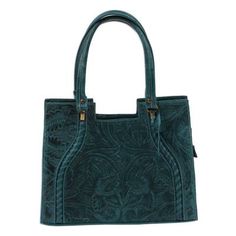 Gorgeous forest green leather embossed with a floral motif as lush as the tropics adorns this sophisticated handbag. Handcrafted by Mexican artisan Fabiola Gonzalez the handbag features a zippered pocket on the exterior and a zippered pocket plus two open pockets in the interior. The main compartment is lined with polyester and secured with a zipper. A detachable strap allows the handbag to also be worn over-the-shoulder. Green Hand-tooled Bag For Daily Use, Green Hand Tooled Bag For Daily Use, Green Hand-tooled Leather Shoulder Bag, Embroidered Leather, Trendy Handbags, Craft Bags, Premium Gift, Bag Handle, Green Leather