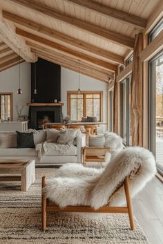 a living room filled with furniture and windows