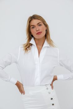 WHITE PIQUE FABRIC This intricate square pique texture reminds us of the most lavish and cozy bed linens—richly indulgent yet gloriously comfortable. 100% Italian Cotton Trying to decide on the perfect white shirt? Check out the Sarah Alexandra White Collection Shirt Guide! THE SIGNATURE SHIRT The Signature Shirt is fashioned with our innovative and fully shapeable one-piece collar for dramatic styling. Pop it high, create an alluring angle, or lay it flat—just follow your mood. The concealed fr The Perfect White Shirt, Perfect White Shirt, Ladies Who Lunch, White Shirt Blouse, Pique Fabric, Fish Eye, Bed Linens, Womens Shirt, Cozy Bed