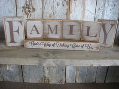 wooden blocks spelling the word family on a bench