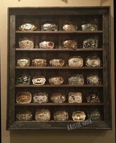 a display case with many different types of rings on it