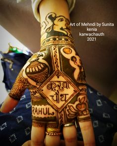 the hand is decorated with an intricate design