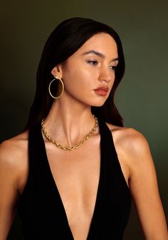 Elevate your personal style with our Serpent Hoop Earrings, crafted from 18K gold dipped brass and adorned with sparkling crystals. Timeless and sophisticated, these earrings are the perfect addition to your jewelry wardrobe, and perfect for an everyday statement or an evening soireé. 18K gold plated brass Crystals 2.25" L X 1.5" W Gold-tone Hoop Earrings For Evening, Gold Plated Hoop Earrings For Party, Trendy Small Hoop Jewelry For Formal Occasions, Gold Plated Hoop Earrings For Party With Matching Set, Trendy Plated Hoop Earrings For Party, Chic Yellow Gold Hoop Earrings For Party, Gold-tone Metal Hoop Earrings For Evening, Chic Metal Hoop Earrings For Evening, Gold Plated Yellow Gold Hoop Earrings For Evening