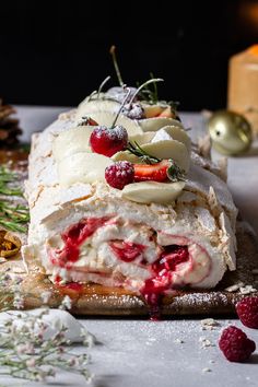 a very tasty looking pastry with some fruit on the top and other toppings around it