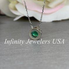 "This necklace is a lab created emerald bezel set with 18 inch diamond cut cable chain, made with pure 14k white gold #5935 -Approximate total carat weight: .80 ct. -Gem Type: Lab created emerald -Stone Shape: Round / 6MM -Stone Color: Lively rich green -Stone Clarity: VS2 -Hardness: 8.5 -Metal Type and Purity: 14k white gold -Setting: Bezel Setting: floating necklace -Chain: 18\" delicate gold chain (heavier chain is available contact us for pricing) -Clouser: Spring ring For customization plea Country Rings, Floating Necklace, Heavy Chain, Lab Created Emerald, White Gold Set, Emerald Necklace, Rich Green, Emerald Stone, Green Stone