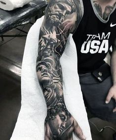 a man with a tattoo on his arm