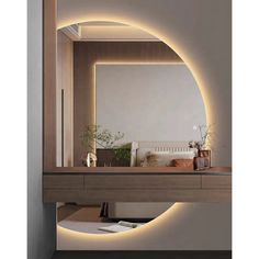 a bathroom mirror with lights on it and a sink in front of the mirror that is illuminated