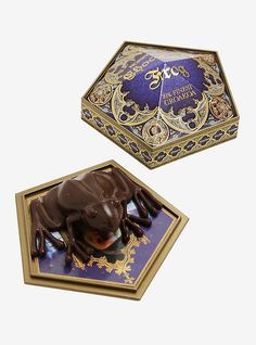 two chocolates in a box on top of each other with an image of a rhino